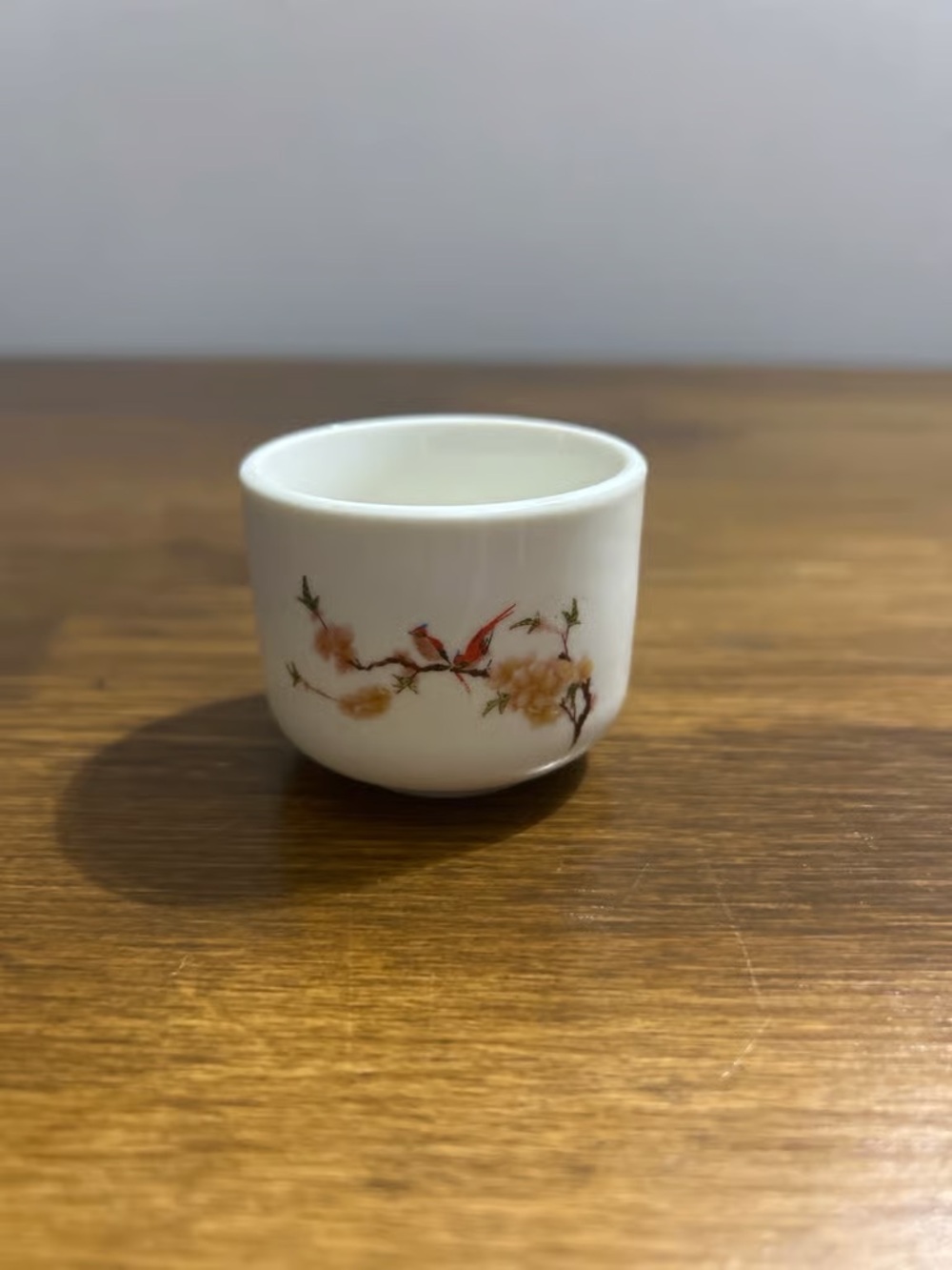 Porcelain Floral Bird Accent Cup in White with Peach Detail